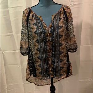 Shear Floral Tunic with Lace Detail.